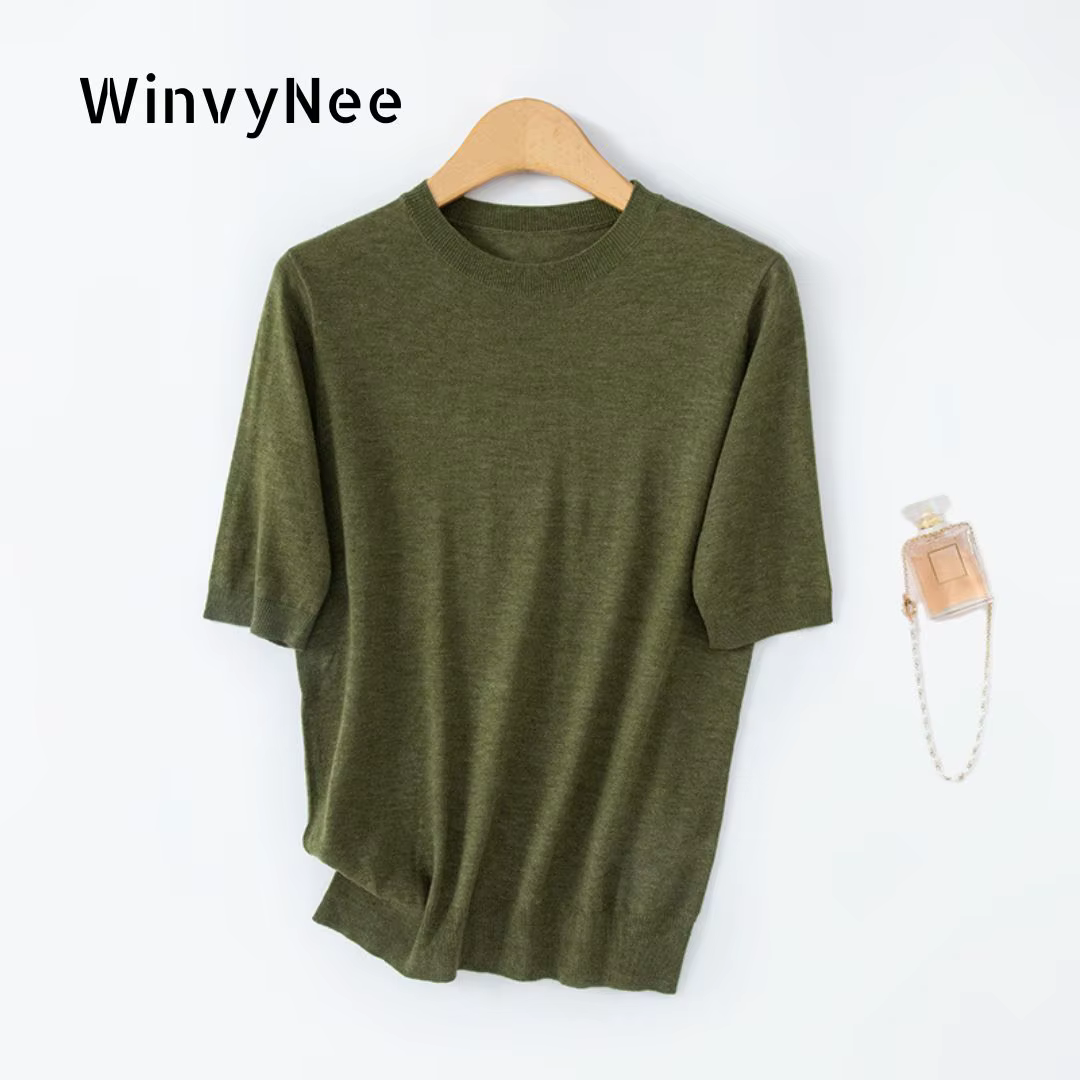 Pull en laine peignée à col rond et manches courtes pour femme