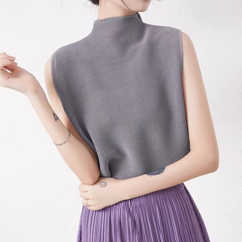 Gilet tendance à col montant pour femme, idéal pour l'été, à porter avec un t-shirt ample, comme sous-vêtement ou un haut sans manches.