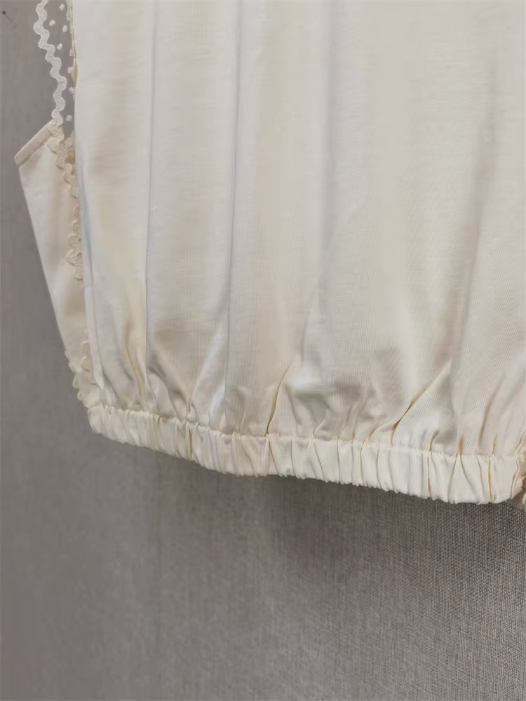 T-shirt sans manches en maille à bordure dentelle pour femme, col rond cintré, collection été 2026