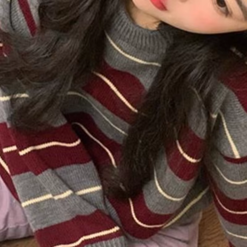 Cette année, le pull rétro ample rayé au look paresseux et haut de gamme pour femme