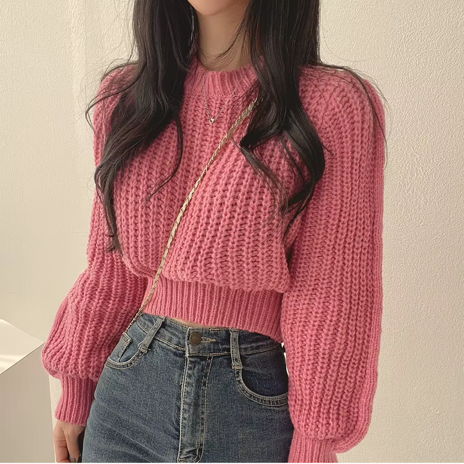 Pull rose à manches bouffantes