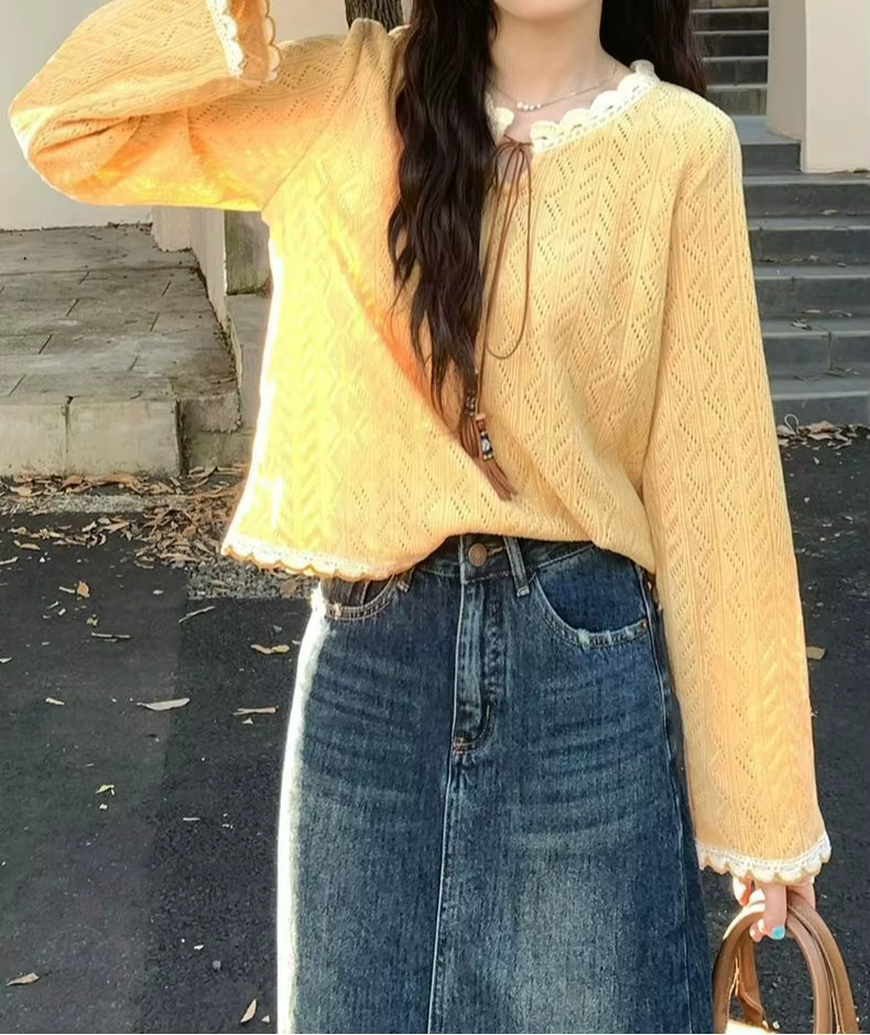 Pull en tricot ajouré jaune doux et élégant pour femme