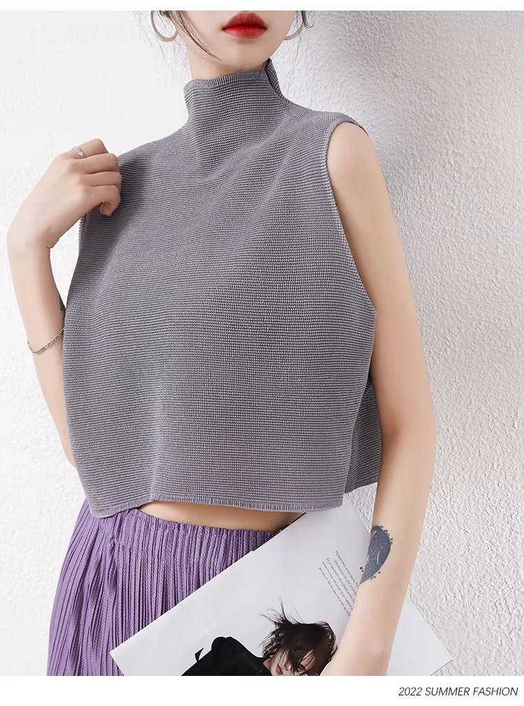 Gilet tendance à col montant pour femme, idéal pour l'été, à porter avec un t-shirt ample, comme sous-vêtement ou un haut sans manches.