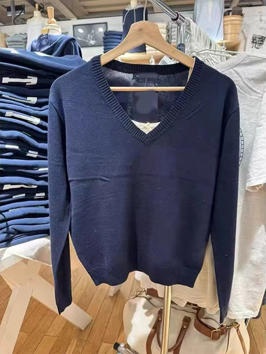 Pull vintage bleu marine à col en V pour femme