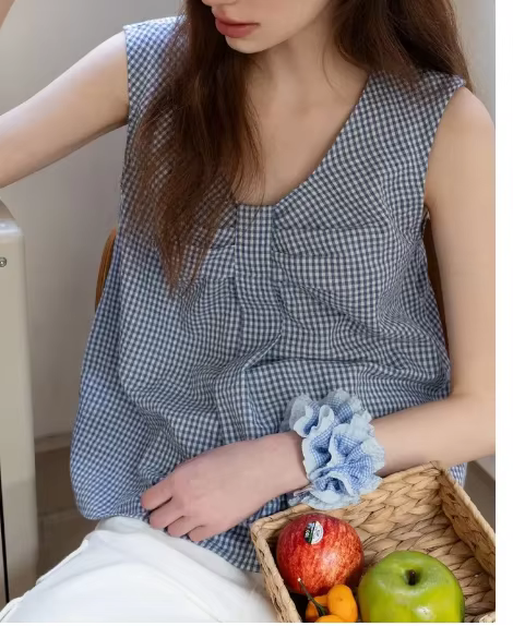 Gilet ample sans manches à carreaux avec nœud pour femme
