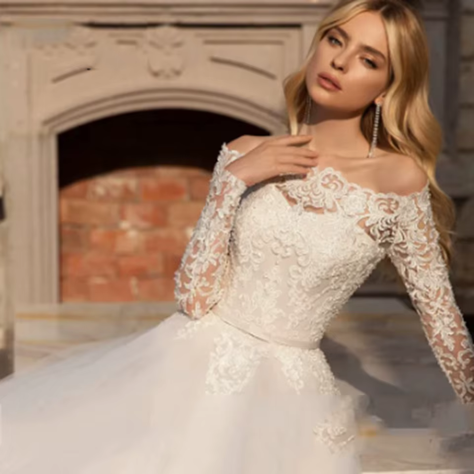 Robes de mariée vintage sexy à col bateau, manches longues, en dentelle, longueur au sol, avec ceinture appliquée, traîne courte, coupe A, 2026