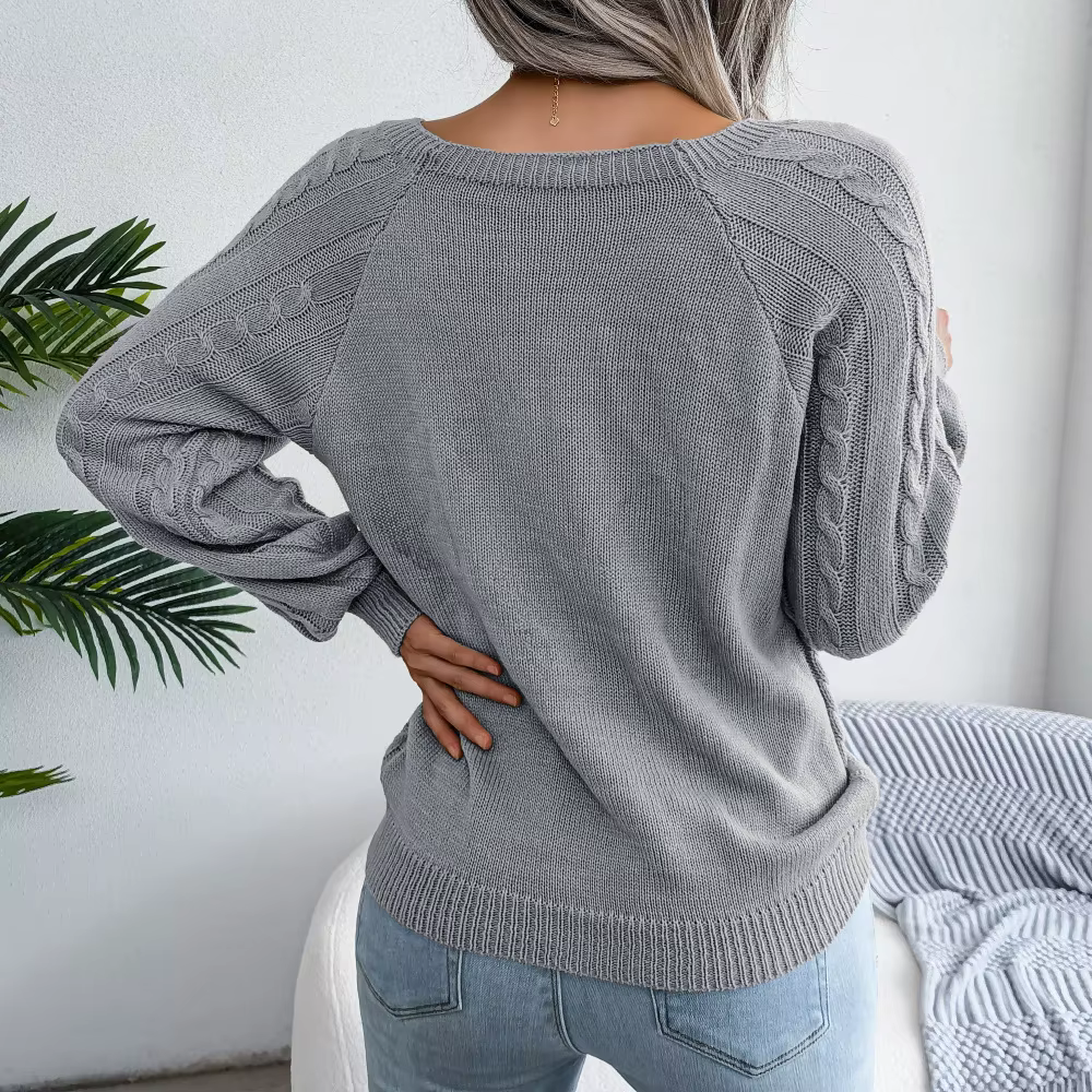 Pull à col rond avec bouton pour femme