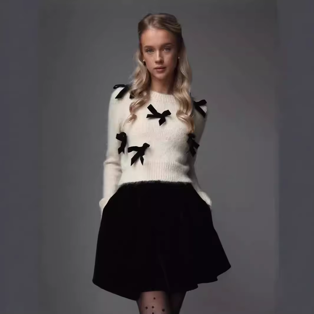 Pull à manches longues avec nœud pour femme