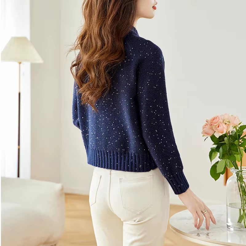 Pull court à fermeture éclair pour femme