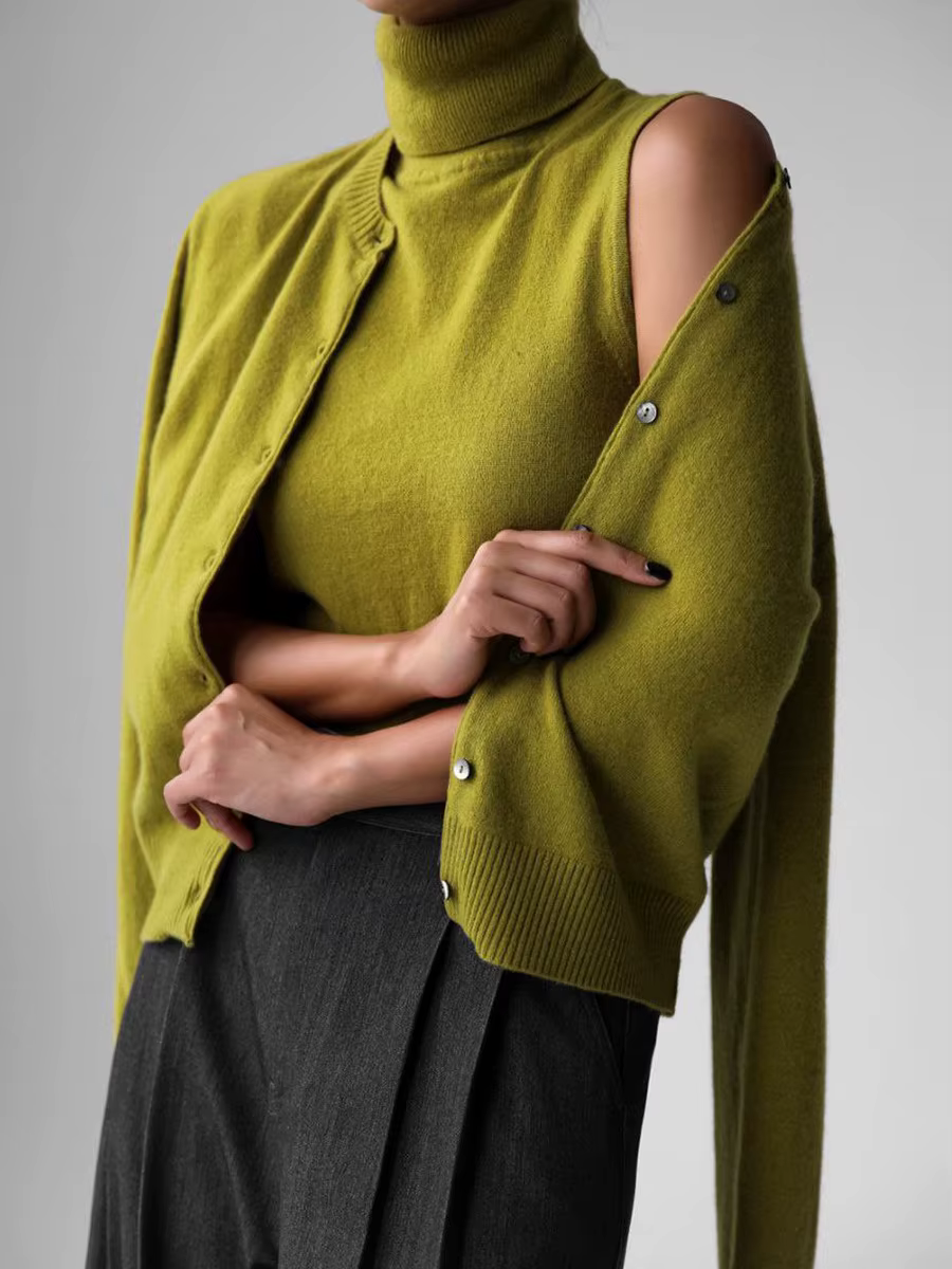 Pull tricoté sans manches à col roulé blanc pour femmes