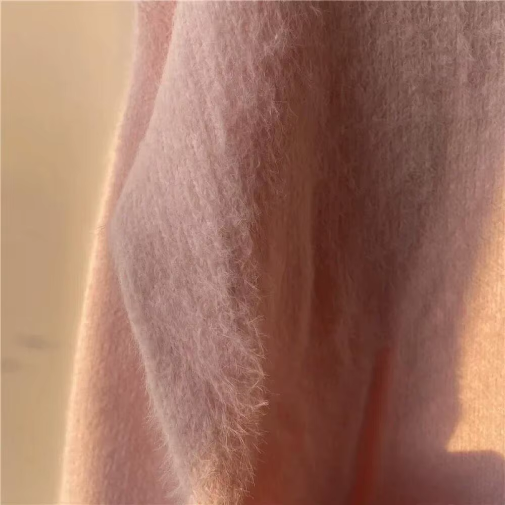 Pull en maille rose pastel pour femme
