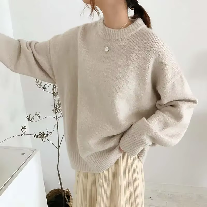 Pull noir à col rond pour femme