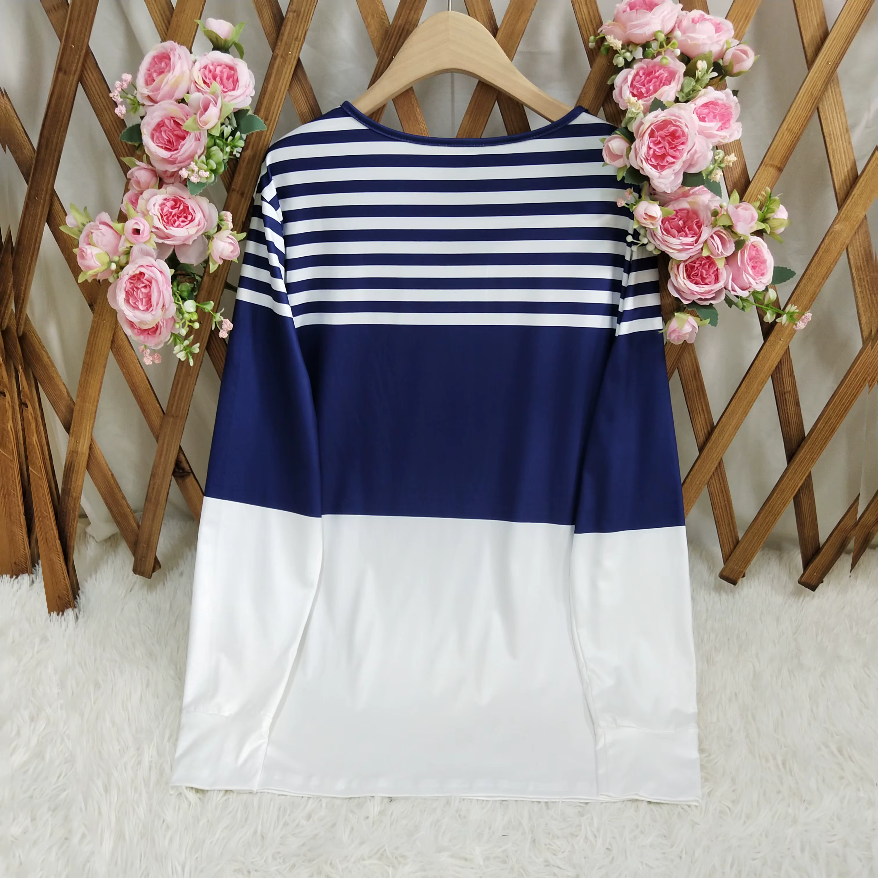 Pull femme quart zippé à rayures