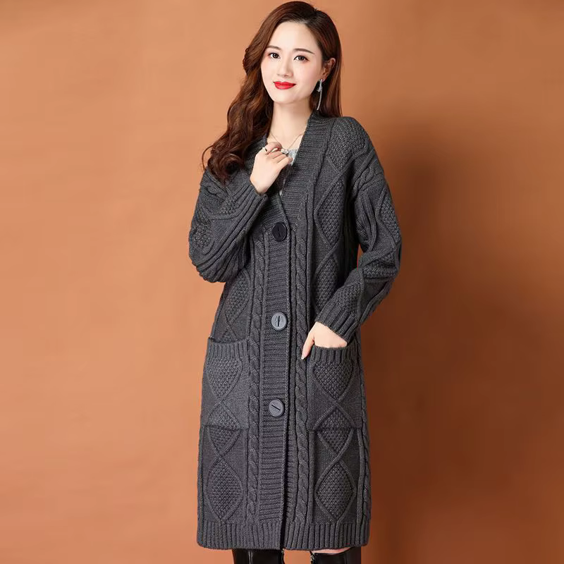 Cardigan en tricot torsadé épais à manches longues avec capuche et poches