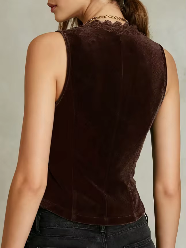 Gilet en velours à col en V pour femmes, avec bordure en dentelle et boutons décoratifs.