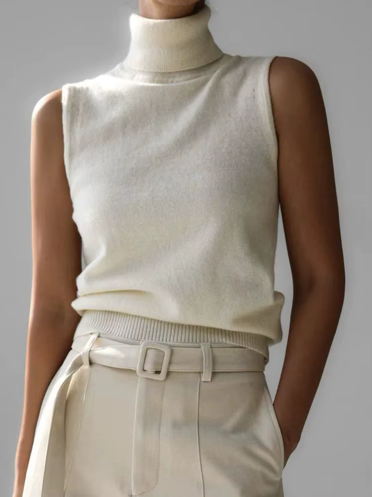 Pull tricoté sans manches à col roulé blanc pour femmes